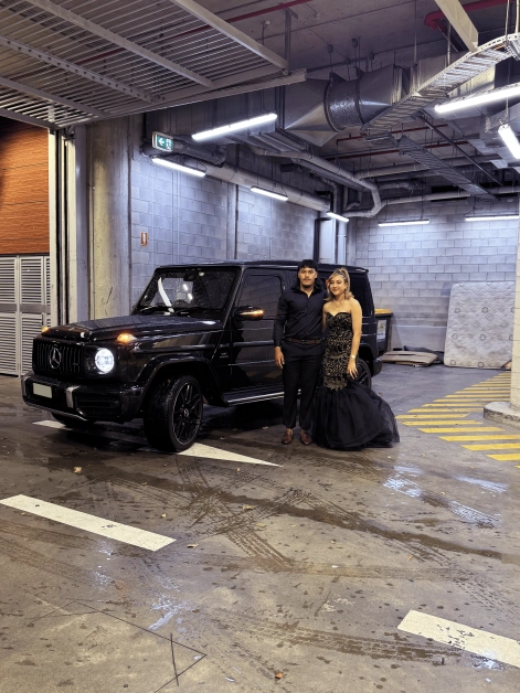 Couple in chauffeured car