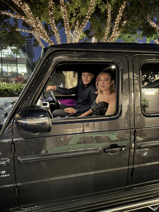 Couple in chauffeured car
